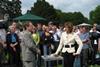 Eric Knowles and Fiona Bruce talking on Antiques Roadshow in front of audience