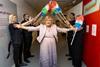 Anne, Lady Dodd officially opens Happiness! The Ken Dodd Exhibition under an arch of tickling sticks!