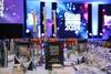 Table settings and stage at the 2024 Group Leisure & Travel Awards