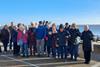 Milton Village Community Association group members on the seafront