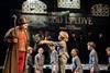 Oliver asks Mr Bumble for more gruel in the West End production of Oliver!