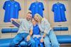 A family take a selfie during an Everton Football Club Stadium Tour