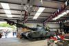 Military tank in warehouse