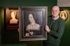 Dr Owen Emmerson holding the Anne Boleyn Hever Rose portrait.