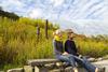 A couple admire the scenery at Eden Project in Cornwall