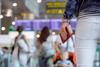 Woman holding tickets and passport in airport