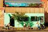 People sat outside a cafe in Melbourne