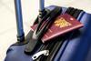 Suitcase and passport