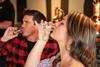 Two people tasting rum at Judith's