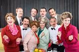 Characters from the Faulty Towers Dining Experience in London