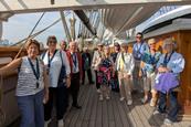 Group on top deck of Cutty Sark