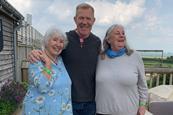 Members of Newton Abbot Travel Club meet Adam Henson at Cotswold Farm Park