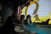 A family explores the new exhibits at the Loch Ness Centre in Scotland