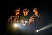 Isabella Pappas as Joyce Maldonado, Oscar Lloyd as James Hopper Jr and Christopher Buckley as Bob Newby in Stranger Things: The First Shadow
