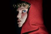 A close up of Little Red Ridinghood in Into The Woods