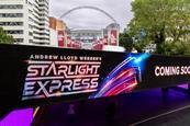 A billboard advertises Andrew Lloyd Webber's Starlight Express show which is returning to the Wembley Park Theatre