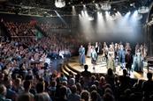 Chichester Festival Theatre auditorium - cast members of the Amadeus production bow to the audience