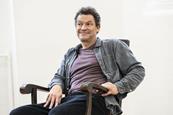 Dominic West sat in a chair during rehearsals for A View from the Bridge