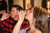 Two people tasting rum at Judith's