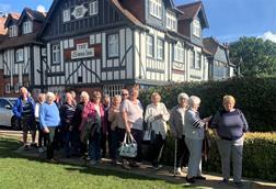 Members of GTO Richard Preston's group waiting to board a pleasure boat on the Norfolk Broads