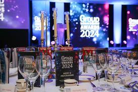 Table settings and stage at the 2024 Group Leisure & Travel Awards