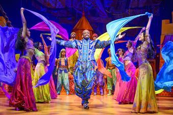 Yeukayi Ushe as Genie in the UK tour of Aladdin