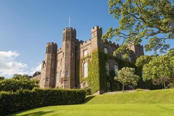 An exterior shot of Scone Palace on a bright sunny day
