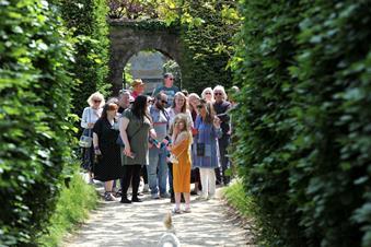Lady Ashcombe leading a group around the gardens on a tour