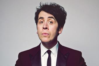 Comedian and magician Pete Firman in a suit