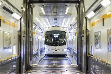 A coach boards LeShuttle