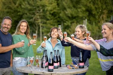 A group enjoying a tasting session at Wiston Estate in Sussex