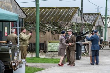 People dress up in authentic dress at the Eden Camp in Yorkshire