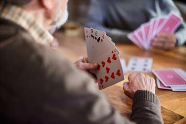 Photo of people playing bridge