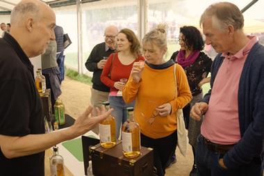 Visitors to the Living Crafts festival at Hatfield Park in Hertfordshire sample some of the drink on offer