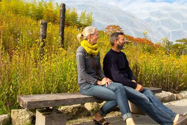 A couple admire the scenery at Eden Project in Cornwall