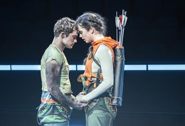 Euan Garrett as Peeta Mellark and Mia Carragher as Katniss Everdeen in The Hunger Games: On Stage