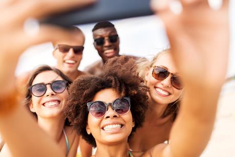 A group on holiday taking a selfie