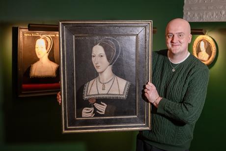 Dr Owen Emmerson holding the Anne Boleyn Hever Rose portrait.