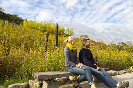 A couple admire the scenery at Eden Project in Cornwall