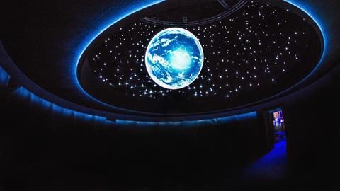 An image of the illuminated earth as part of the BBC Earth Experience in London.