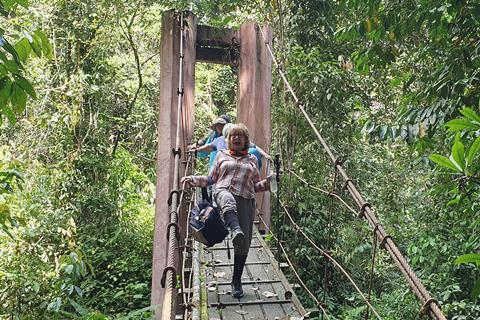 Members of Solent Events & Leisure/On Tour on a bridge in Borneo