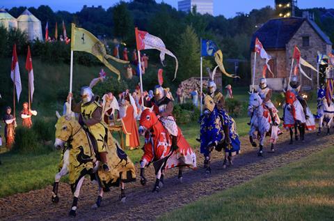 Knights and horses riding together at Kynren - An Epic Tale of England