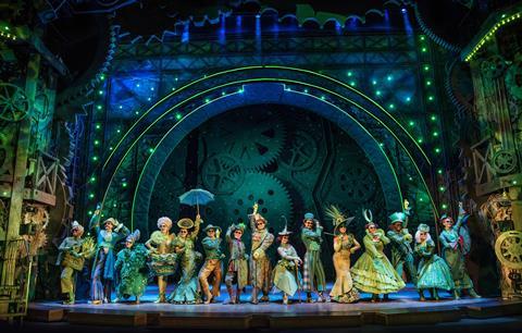 Some of the 2023-24 West End Wicked cast on stage at the Apollo Victoria Theatre in London.
