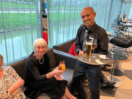 GTO Marian Durbidge is served a drink by a butler on board a Scenic river cruise ship.