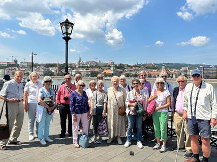 Members of Gwen Wright's group pictured in front of the river in Budapest. 