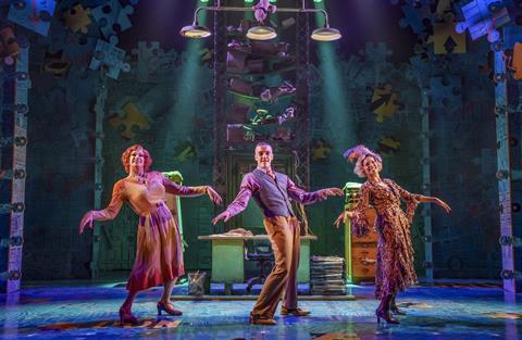 Craig Revel Horwood (Miss Hannigan), Billie-Kay (Lily) and Paul French (Rooster) on stage in the Annie musical