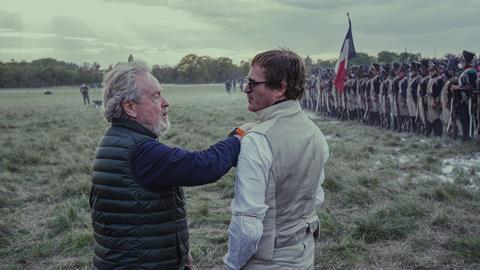 Ridley Scott directs Joaquin Phoenix on the set of Napoleon