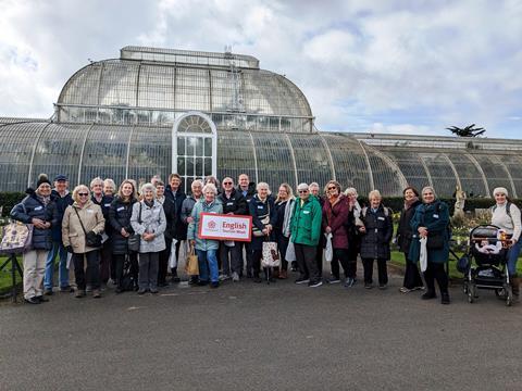 The group outside the Palm House at Kew Gardens during the Richmond Reader Club trip.