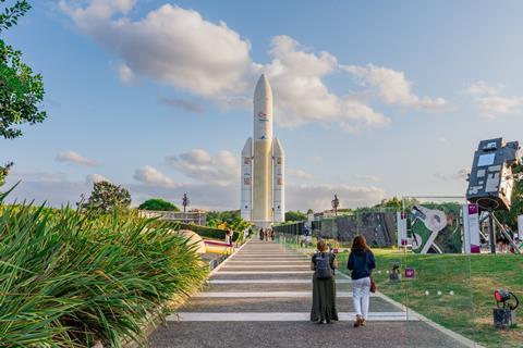 Women walking towards rocket at Cité de l'espace, Toulouse, France