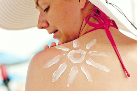 Suncream on a woman's shoulder
